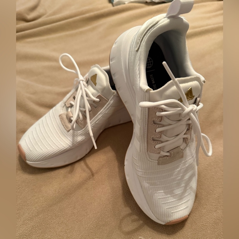 Adidas women’s White w/tan athletic shoes, size 8.